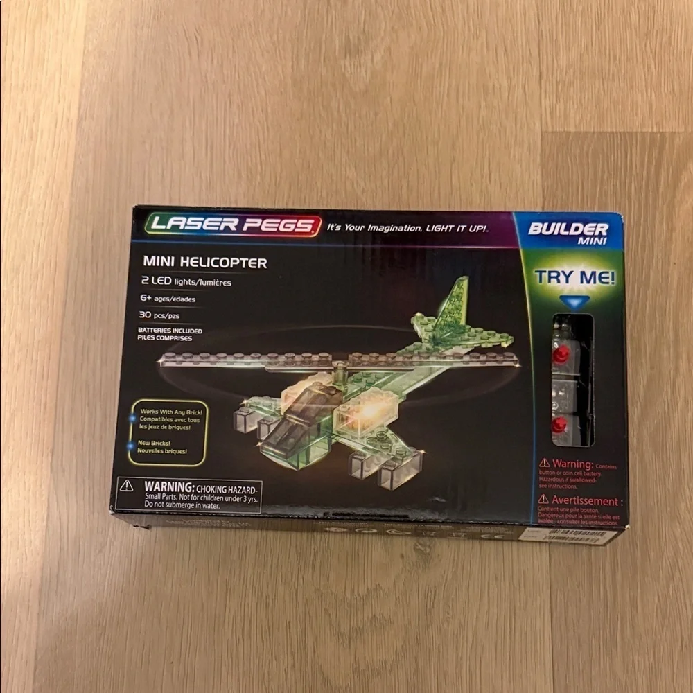 Laser pegs mini helicopter set new in sealed box